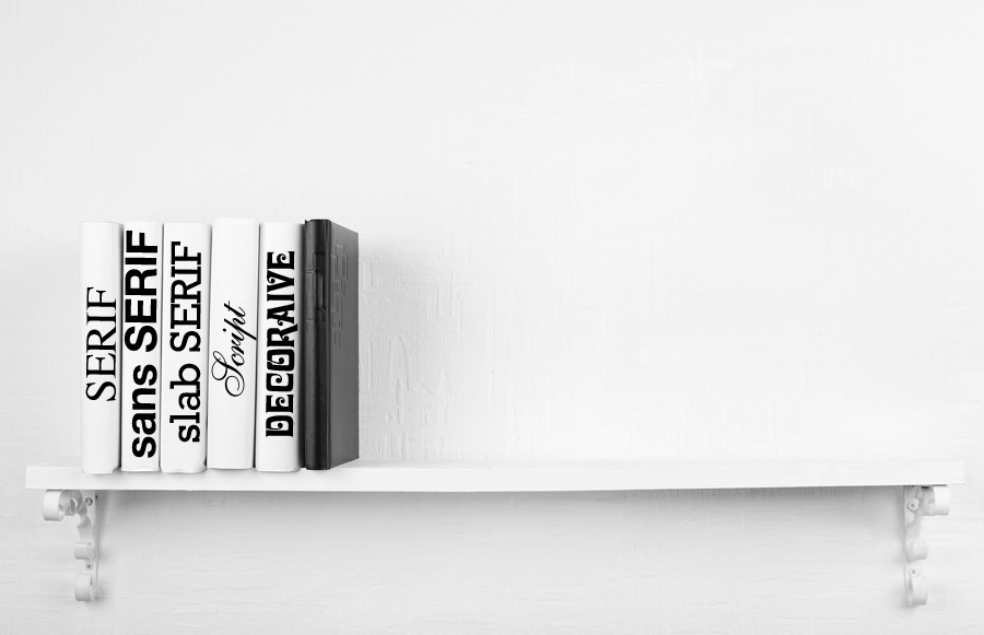 Blank books with black one on bookshelf on white wall background